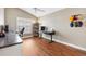 Bright office space with hardwood flooring, functional desk, and bright natural lighting at 2465 Violet Ct, The Villages, FL 32162