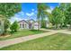 Lovely single-story home boasting a manicured lawn, tidy landscaping, and a two-car garage at 3213 White Blossom Ln, Clermont, FL 34711