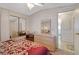 Bedroom featuring built-in closet and natural light at 32339 Oak Park Dr, Leesburg, FL 34748