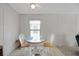 Dining area with light, neutral walls and a ceiling fan at 32339 Oak Park Dr, Leesburg, FL 34748