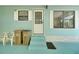 Cozy front entrance with ample space for seating or storage at 32339 Oak Park Dr, Leesburg, FL 34748