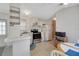 Compact eat-in kitchen with stainless appliances and functional design at 32339 Oak Park Dr, Leesburg, FL 34748