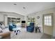 Bright and airy living room with large windows and comfortable seating at 32339 Oak Park Dr, Leesburg, FL 34748