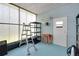 Storage area with ladder, shelving and ample room for organization and storage at 32339 Oak Park Dr, Leesburg, FL 34748