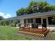 A spacious backyard deck complements this home's exterior at 40 N Triplet Lake Dr, Casselberry, FL 32707