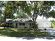 Charming single-story home with a well-maintained lawn and mature trees in a quiet neighborhood setting at 40 N Triplet Lake Dr, Casselberry, FL 32707