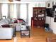 Comfortable living room with hardwood floors, natural light, and stylish furnishings at 40 N Triplet Lake Dr, Casselberry, FL 32707