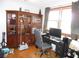 This office features hardwood floors, and two windows with blinds at 40 N Triplet Lake Dr, Casselberry, FL 32707