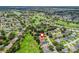 Scenic aerial view of the neighborhood, featuring the home and its location near a golf course at 487 Thistledown Way, The Villages, FL 32162