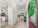 View of the foyer through the front door at 487 Thistledown Way, The Villages, FL 32162