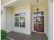 Classic covered front porch at 487 Thistledown Way, The Villages, FL 32162