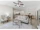 Open living space flows into dining room and kitchen at 487 Thistledown Way, The Villages, FL 32162