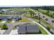 A high angle view showcases this home's proximity to the local highway and beautiful neighboring community at 4874 Noreen Ct, The Villages, FL 32163