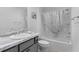 Bathroom boasts a tub and shower combination with a large vanity sink at 4874 Noreen Ct, The Villages, FL 32163