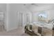 Bright bedroom with a ceiling fan, a window with blinds, and neutral decor at 4874 Noreen Ct, The Villages, FL 32163