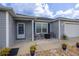 Cozy front porch with table and chairs, perfect for enjoying the outdoors at 516 Junction Pl, The Villages, FL 32163