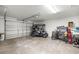 Spacious two-car garage, with golf cart, room for storage and convenient access at 516 Junction Pl, The Villages, FL 32163