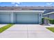 Spacious two car garage and extended driveway at 520 Rainbow Springs Loop, Groveland, FL 34736
