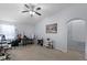 Spacious living room with comfortable seating and work space at 520 Rainbow Springs Loop, Groveland, FL 34736