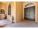 Covered front porch featuring double doors and elegant accents at 5235 Greens Dr, Lady Lake, FL 32159