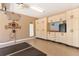 Well-maintained garage with epoxy flooring, ample storage cabinets, and work area at 5235 Greens Dr, Lady Lake, FL 32159