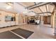 Spacious garage with ample storage, golf cart parking and a well-organized interior space at 5235 Greens Dr, Lady Lake, FL 32159