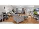Bright living room features hardwood floors, neutral paint, and modern furniture at 5460 Sw 103Rd Street Rd, Ocala, FL 34476