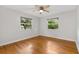 Bright bedroom with hardwood floors and double paned windows at 601 S 12Th St, Leesburg, FL 34748