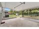 Spacious screened in porch offers a relaxing outdoor space with views of the backyard at 601 S 12Th St, Leesburg, FL 34748