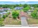 Charming home showcasing a well-maintained yard and inviting two-car garage at 6316 Marlberry Dr, Orlando, FL 32819