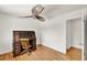 Bedroom featuring wood floors, ceiling fan, and doorway at 6316 Marlberry Dr, Orlando, FL 32819