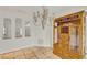 Dining area featuring stylish chandelier lighting and a view of the front entrance at 6316 Marlberry Dr, Orlando, FL 32819