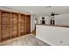 Living room featuring a stylish tiled floor and built-in shelving units at 6316 Marlberry Dr, Orlando, FL 32819