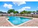 Backyard pool with brick paver deck and fenced perimeter at 6316 Marlberry Dr, Orlando, FL 32819