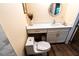 This is a renovated bathroom with a tiled shower, toilet, and vanity with gold hardware and a mirror at 681 Greywood Dr, Altamonte Springs, FL 32701
