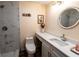 This is a renovated bathroom featuring a tiled shower and a vanity with a white countertop at 681 Greywood Dr, Altamonte Springs, FL 32701