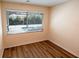 Bedroom with view to Pool is freshly painted and offers wood floors, trim and natural light at 681 Greywood Dr, Altamonte Springs, FL 32701