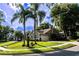 Well-maintained home on a corner lot with lush landscaping and mature trees, enhancing its curb appeal at 681 Greywood Dr, Altamonte Springs, FL 32701