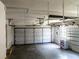 The property has a two-car garage with a door opener and shelving for ample storage space at 681 Greywood Dr, Altamonte Springs, FL 32701