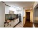 Bright kitchen with stainless steel refrigerator, wood counters, and stylish backsplash at 681 Greywood Dr, Altamonte Springs, FL 32701
