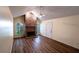 Vaulted ceiling living room with brick fireplace, hardwood floors, and lots of natural light at 681 Greywood Dr, Altamonte Springs, FL 32701