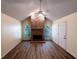 Living room with fireplace, hardwood flooring, white trim and natural light at 681 Greywood Dr, Altamonte Springs, FL 32701