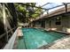 Relaxing screened-in pool featuring multiple entry points and access to the home, great for enjoying sunny days at 681 Greywood Dr, Altamonte Springs, FL 32701