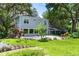 Home with spacious backyard and patio, perfect for outdoor entertaining at 9223 Silver Lake Dr, Leesburg, FL 34788