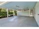 Spacious covered parking area with lighting and access to storage at 9223 Silver Lake Dr, Leesburg, FL 34788