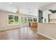Bright great room with French doors leading to the landscaped backyard at 9223 Silver Lake Dr, Leesburg, FL 34788