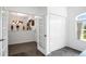 Inviting home foyer adjacent to a home office space at 9702 Pepper Tree Pl, Wildwood, FL 34785