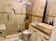 Bathroom featuring tiled shower with glass door, vessel sink, and stone accents at 10301 Savannah Ridge Ln, Winter Garden, FL 34787