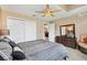 Bedroom with ensuite bathroom and view to living area at 1032 Ventura Dr, Lady Lake, FL 32159