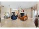 Spacious living room featuring tile floors, modern furnishings, and elegant decor at 1032 Ventura Dr, Lady Lake, FL 32159